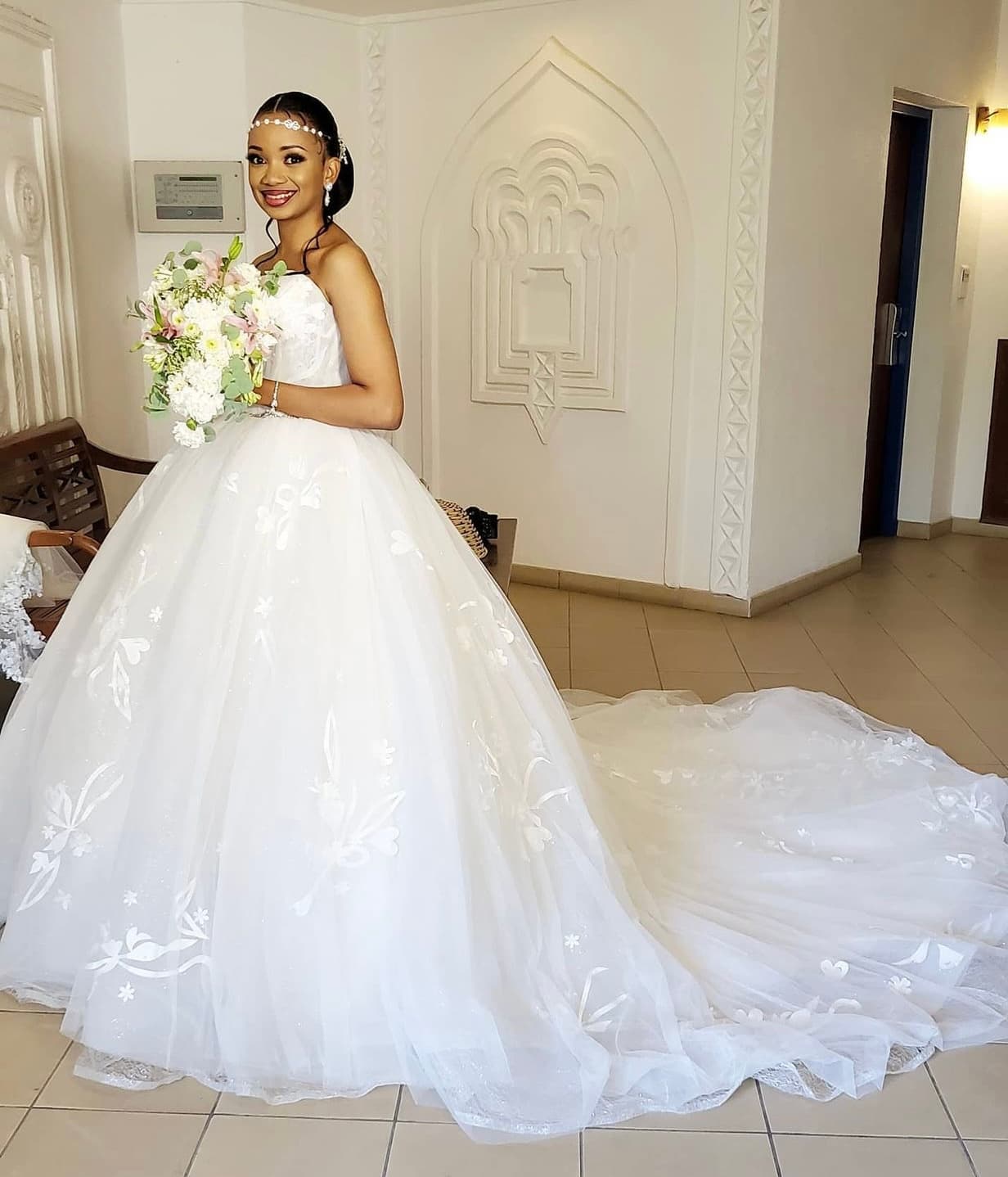 Elegant Off-White Floral Embroidered Ball Gown Wedding Dress, photo 1 of 4